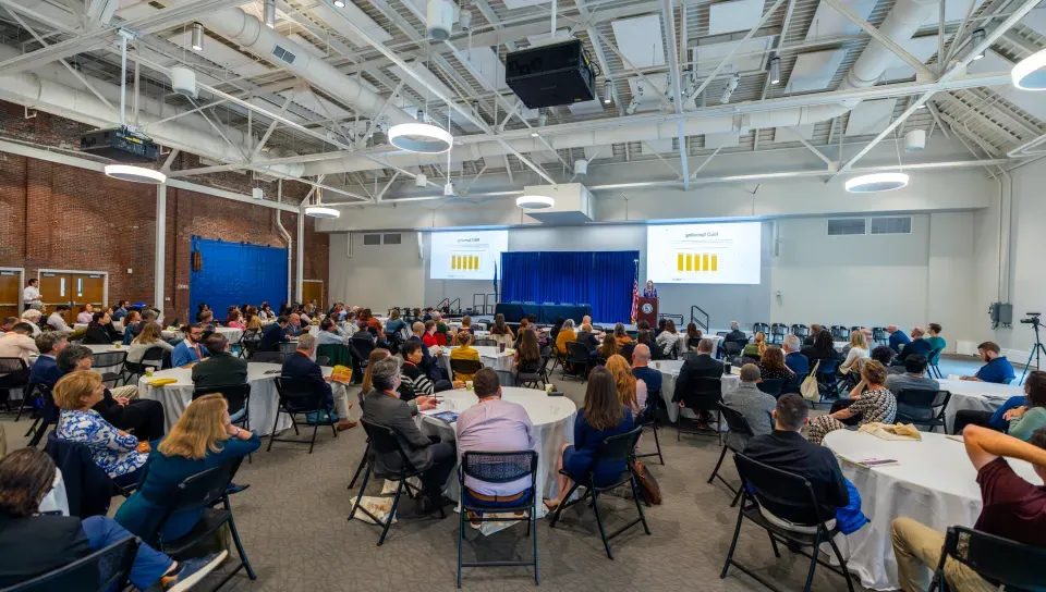 Innovation Hall at UNE is filled with conference attendees